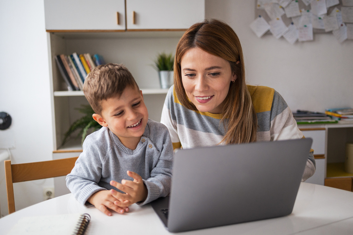 Licensed from Getty: Mother and son with computer